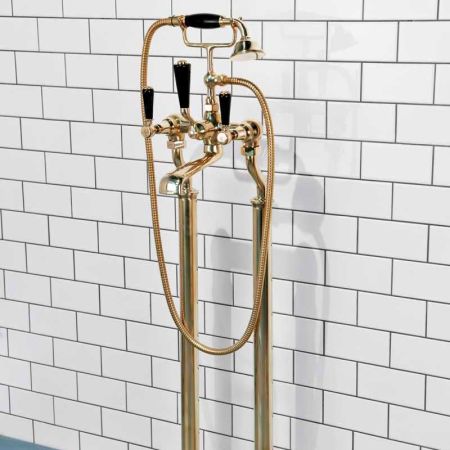 Linton Floor Mounted Bath Shower Mixer With Black Levers in Living Brass