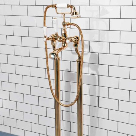 Linton Floor Mounted Bath Shower Mixer with White Levers in Living Brass