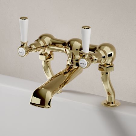 Linton Deck Mounted Bath Filler with White Levers in Timeless Brass