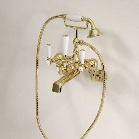 Linton 2 Hole Bath Shower Mixer with White Levers in Timeless Brass