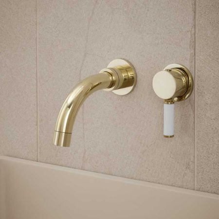 Senska - 2-Hole Basin Mixer - Wall Mounted - White Lever - Short Spout - Polished Brass