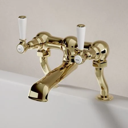 Linton Classic Deck Mounted Bath Filler with White Levers in Timeless Brass