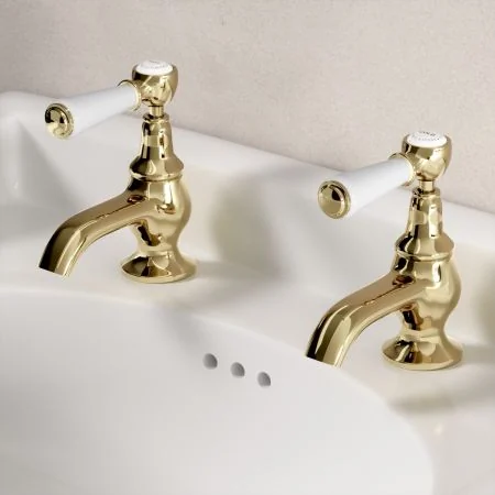Linton Classic Basin Pillar Taps with White Levers in Timeless Brass